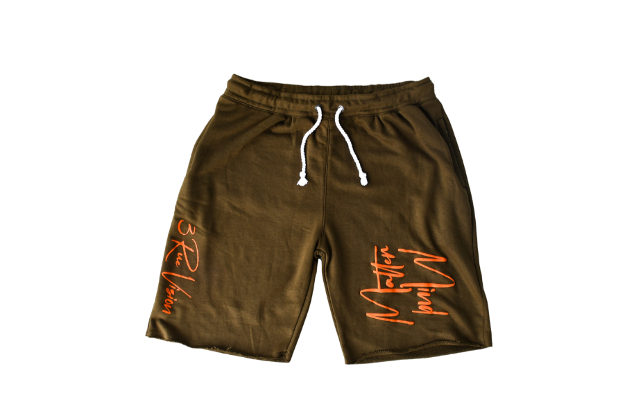 Green shorts with orange text on a white background