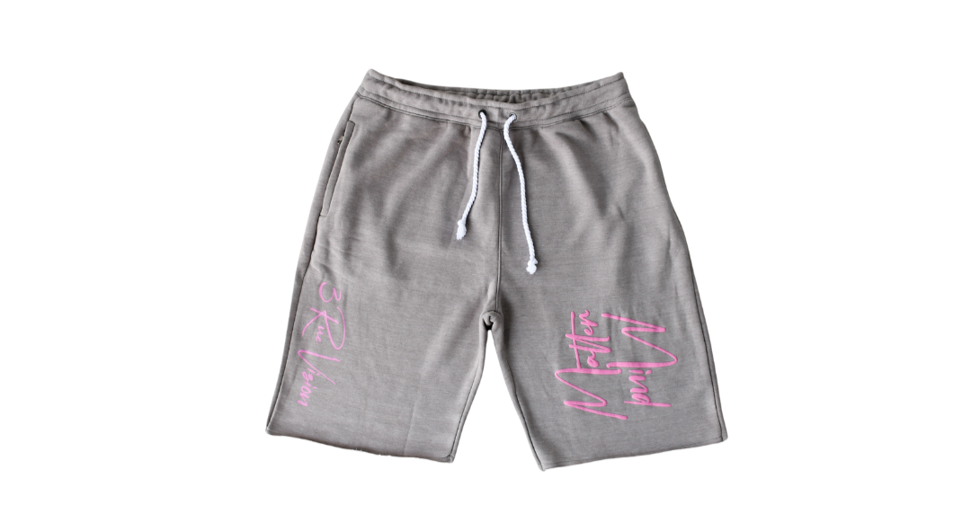 Gray shorts with pink text on a white background