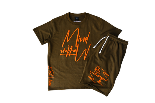 Green  t-shirt and shorts set with orange text on a white background