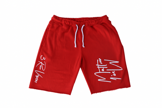 Red shorts with white text on a white background