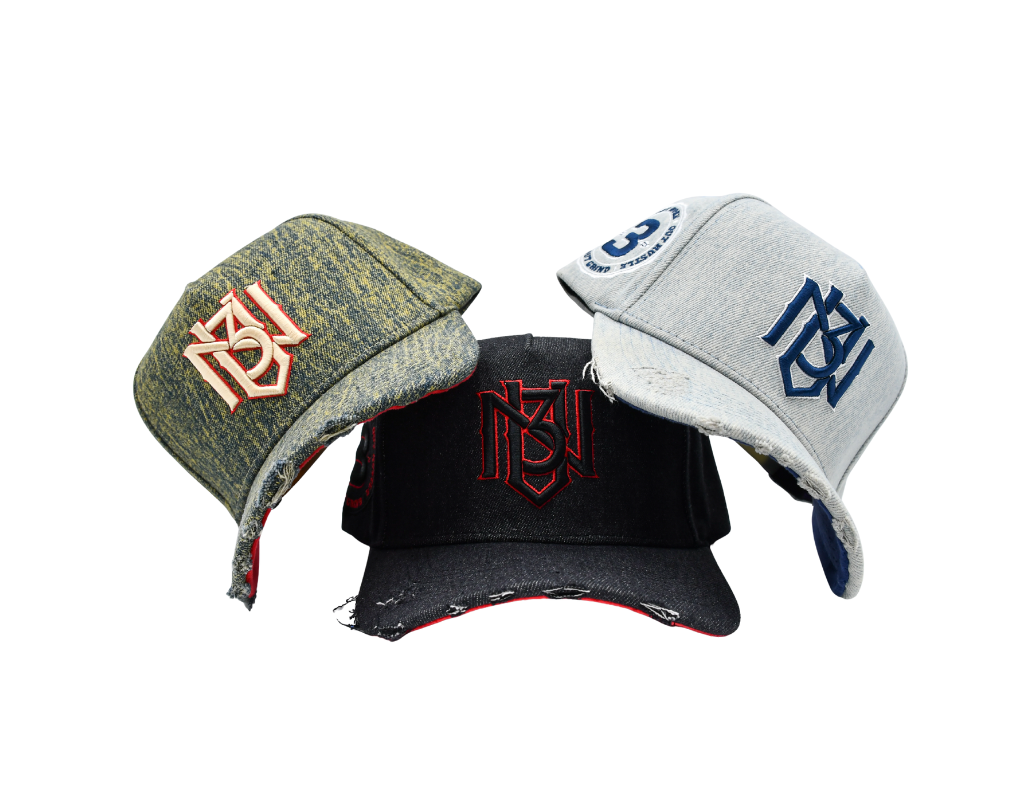 Three baseball caps with different designs and colors on a white background