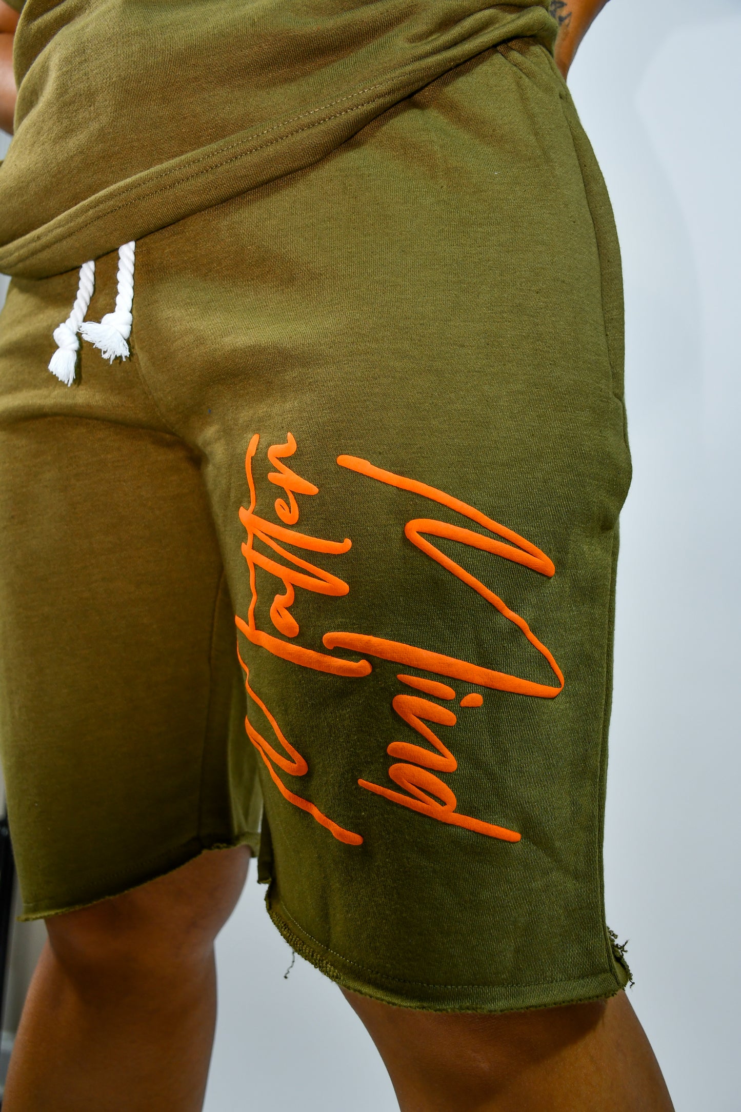 Mind Over Matter Distressed Shorts – Green/Orange